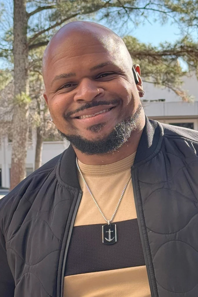 Omar Phillips (they/them)